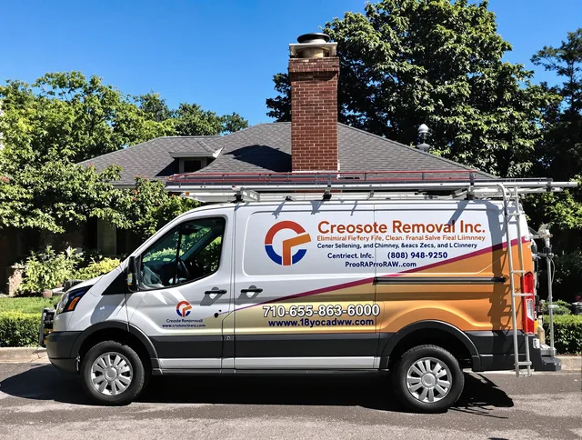 Wilmington Island Chimney Sweep technician removing creosote safely in Wilmington Island, GA